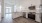 kitchen with beige backsplash and pendant lighting