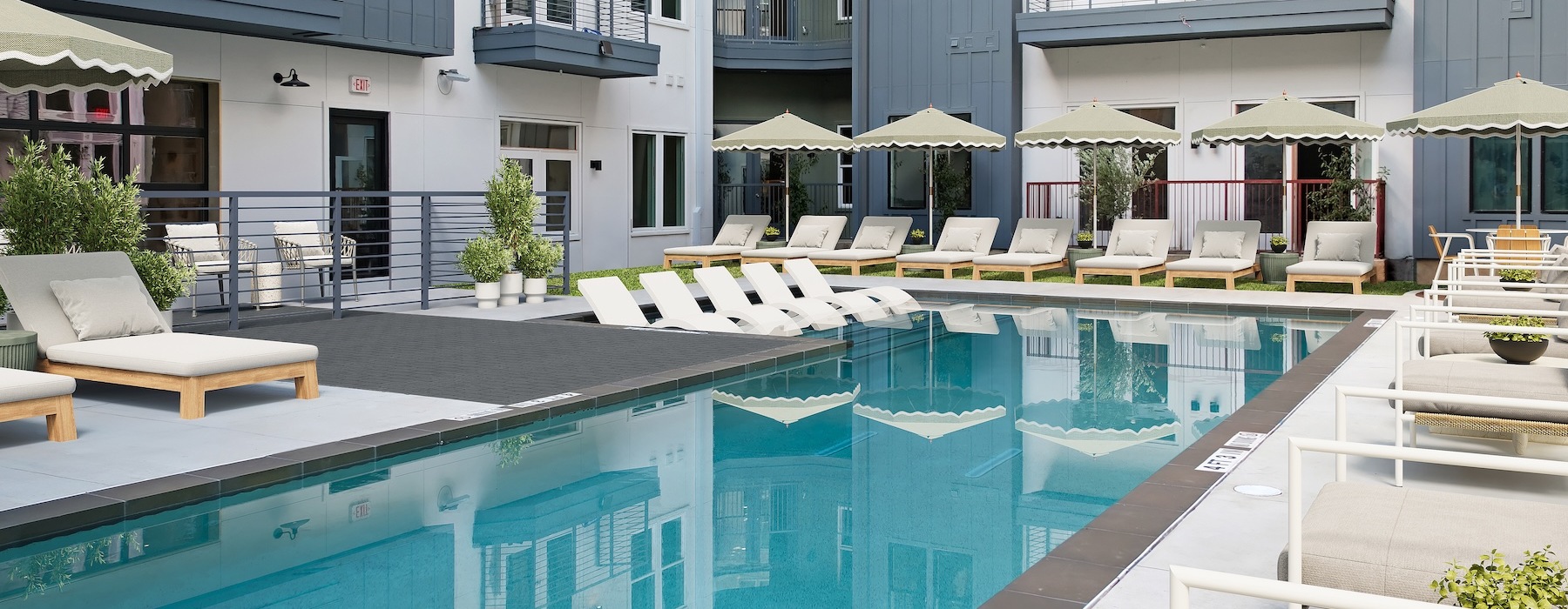 virtual staging of the pool courtyard featuring tanning deck, ample seating, and umbrellas