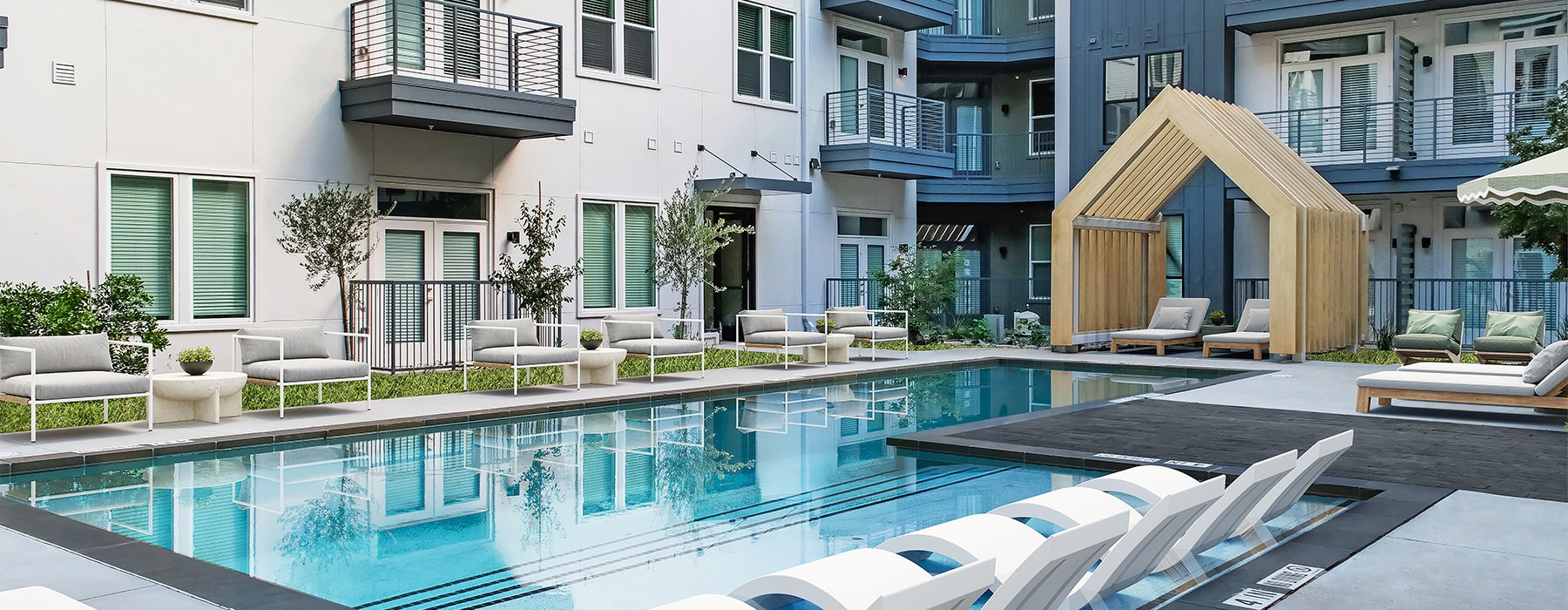 pool with lounge chairs